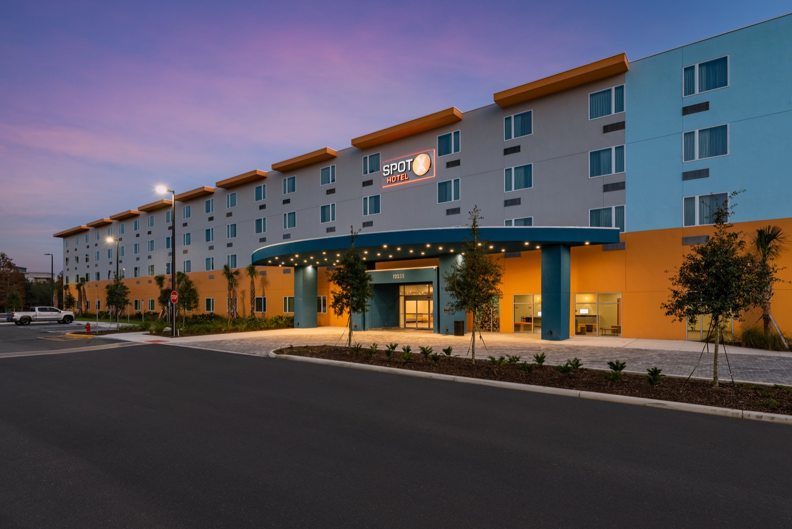 Spot X Hotel Orlando exterior at dusk